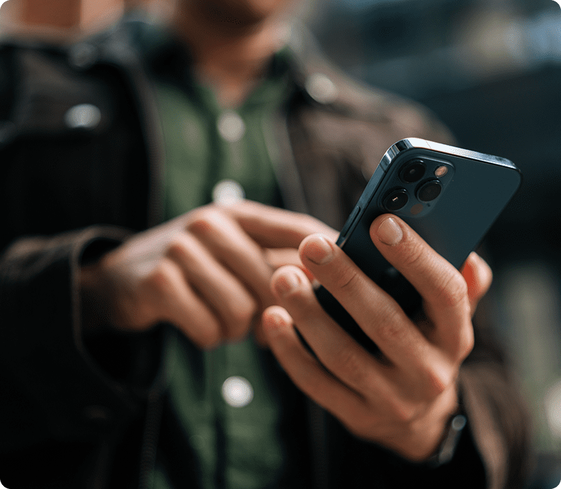 Man texting on mobile phone