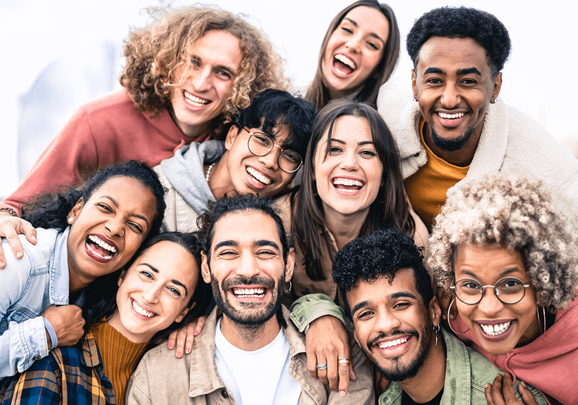 Group of friends smiling outdoors