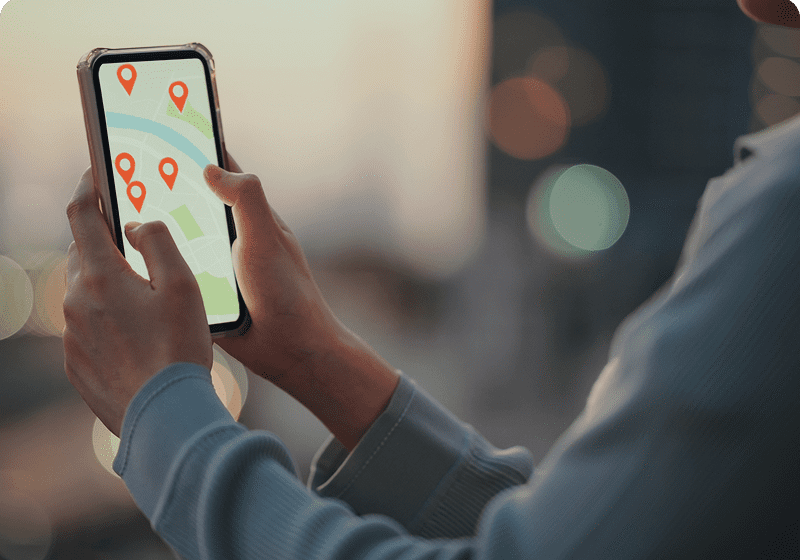 Person using phone with map app